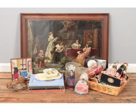 A box of miscellaneous along with a large picture. Includes international doll figures, William Duesbury II reference book, G