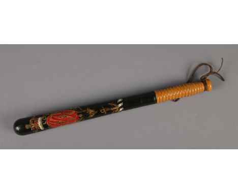 A painted Special Constable Police Truncheon. Approx. length 45cm.  Paint is flaking.