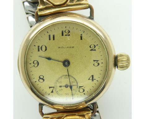 WALTHAM: gents manual wind gold plated wristwatch, with subsidiary seconds dial, on a gold plated expanding bracelet, working