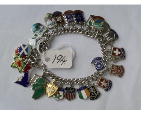 Silver heavy charm bracelet with numerous silver & enamel flag charms 41.5g      