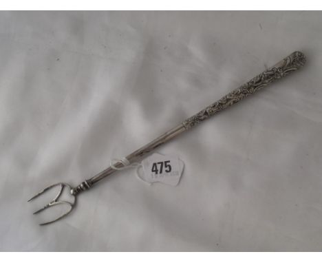 A bread fork with foliate embossed handle 11” long   Lon 1894        