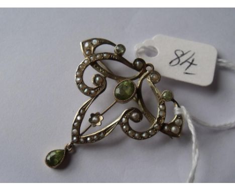 Art Nouveau style pearl and peridot brooch mounted in 9ct  4cm wide        