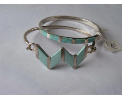 Two silver and enamel bangles 29g     