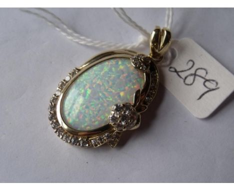 Large 14ct gold opal & white stone pendant 3.5cm   long 8g inc        