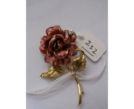 A GOOD DIAMOND AND ENAMEL rose brooch  set with a single diamond      