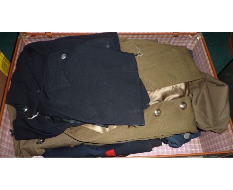 Vintage suitcase containg large selection of military uniforms including No2 dress uniform, tunics, jackets etc.