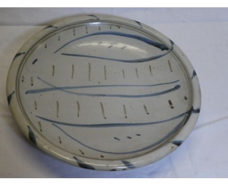 A Wenford Bridge Studio pottery circular bowl by Michael Cardew with lined decoration on grey ground, signed, 10½" diameter