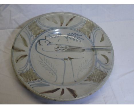 A Seth Cardew Wenford Bridge pottery circular shallow bowl with painted bird decoration, signed, 12" diameter