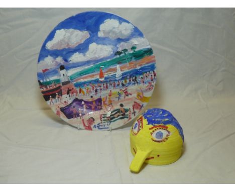 Simeon Stafford - A painted ceramic plate depicting St Ives scene with figures, signed, 10½" diameter and a painted ceramic n
