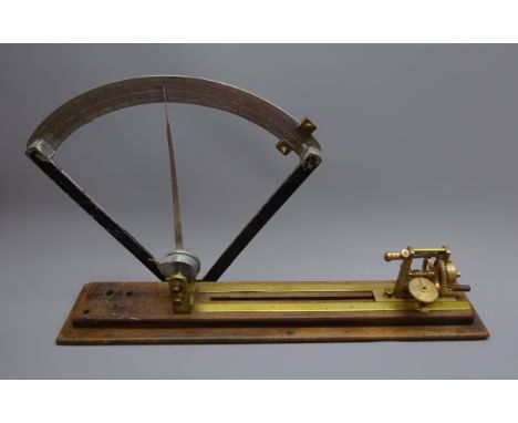 Brass cotton mill yarn tester, adjustable bed with alloy scale on mahogany base, L68cm, H38cm