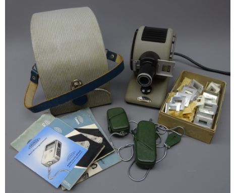 Minox Spy camera and light meter in green leather cases with manuals etc and a Minox slide projector 