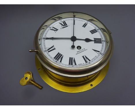 20th century Smith's of Cricklewood brass cased bulk head clock, white enamel Roman dial with sweep seconds, chromed bezel an