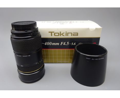 Tokina AF 80~400mm F4.5~5.6 lens to fit Nikon with lens hood, in original box with instruction manual 