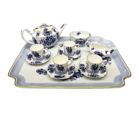 Late Victorian Coalport cabaret set for four persons, decorated with blue floral sprays and gilding upon plain ground, compri