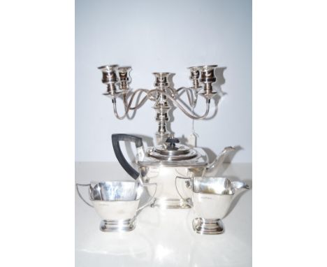 Silver plated art deco style tea service together with a 5 branch candelabra