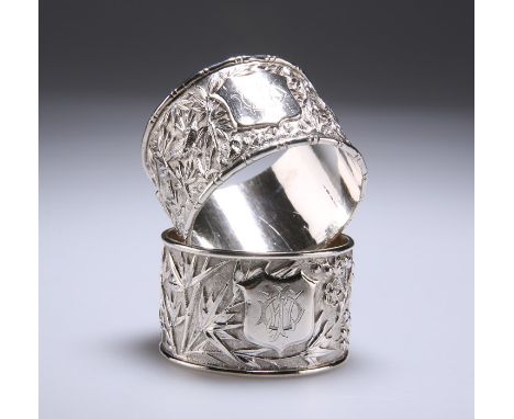 TWO CHINESE SILVER NAPKIN RINGSby Woshing, Shanghai, late 19th CenturyCircular, each chased with birds amidst blossoming tree
