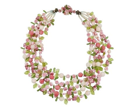 A LUCITE NECKLACE, BY DIOR, CIRCA 1966The multi-strand necklace, alternately strung with moulded lucite beads in the form of 