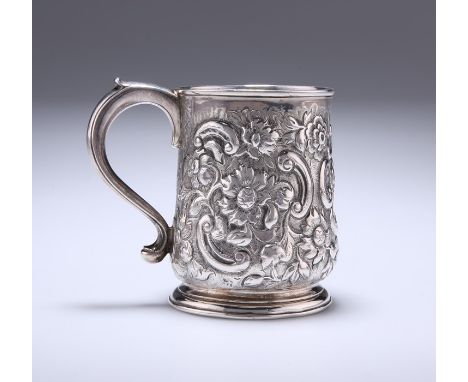 A GEORGE II SILVER MUGprobably by Richard Burcombe, London 1732Of baluster form on spreading foot, later chased with foliage 