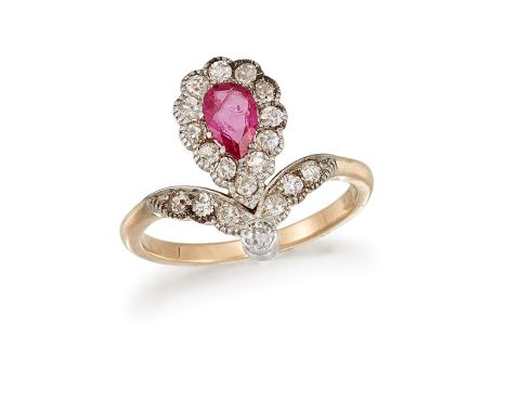 A RUBY AND DIAMOND DRESS RINGThe pear-shaped ruby, surrounded by old brilliant-cut diamonds, attached to a similarly-set hoop