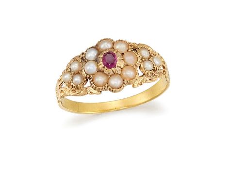 A MID 19TH CENTURY HALF-PEARL AND RUBY RINGThe scrolling openwork mount, set with an oval-cut ruby and half pearls, ring size