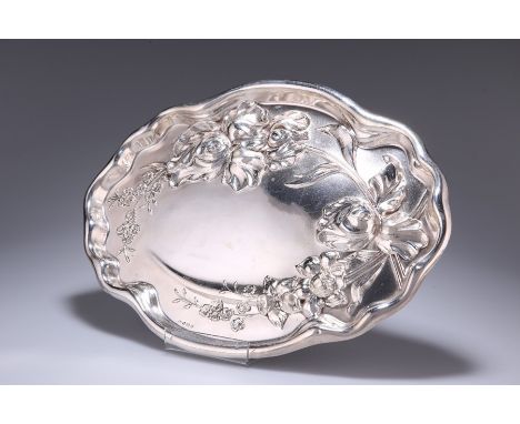 AN ART NOUVEAU SILVER DRESSING TABLE TRAYby Thomas Bishton, Birmingham 1907Shaped oval form, repousse in high relief with sty