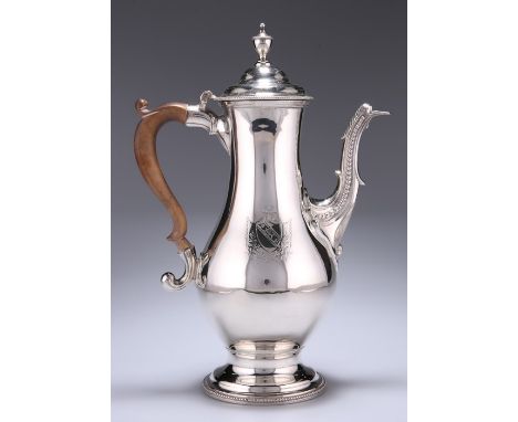 A GEORGE III SILVER COFFEE POTby Charles Wright, London 1780Baluster form, scroll handle, scroll and bead mounted spout, the 