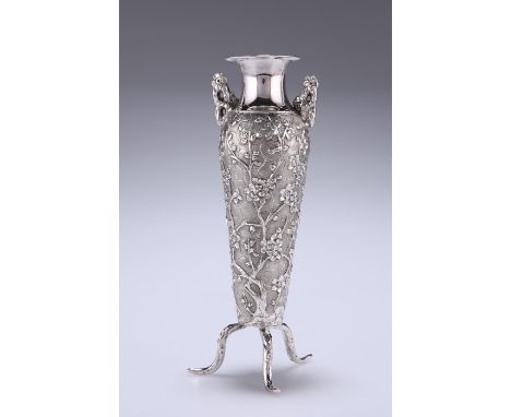 A CHINESE EXPORT SILVER VASEby Wang Hing & Co, Hong Kong, late 19th/early 20th CenturyShouldered ovoid form, chased with prun