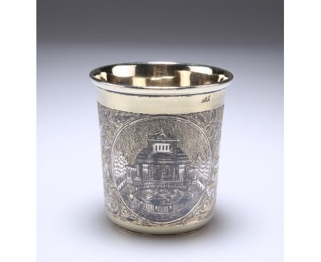 A FINE RUSSIAN SILVER-GILT AND NIELLO BEAKERmaker's mark AK (Cyrillic), Moscow 1842Conical, decorated with a galloping cavalr