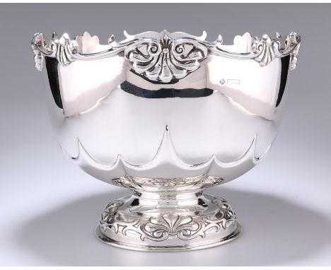 A LARGE EDWARDIAN SILVER PUNCH BOWLby Richard Martin & Ebenezer Hall, Sheffield 1906With openwork shell and scroll cast borde