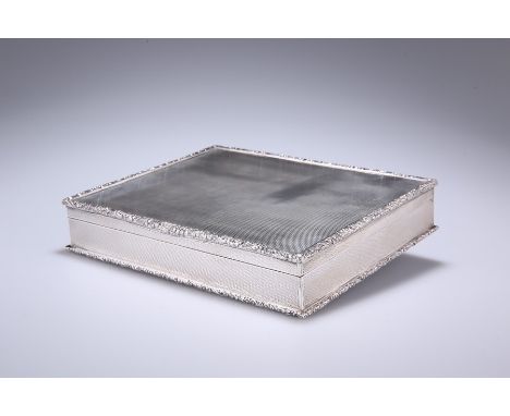 AN ELIZABETH III SILVER CIGAR BOX OF FINE QUALITYby Richard Comyns, London 1960Rectangular with engine-turned lid and sides, 