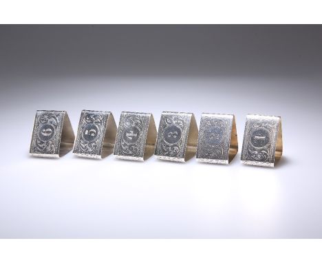 A SET OF SIX GEORGE V SILVER NAPKIN RINGSby Docker & Burn Ltd, Birmingham 1920 and 1921Triangular, engraved with scrolling fo
