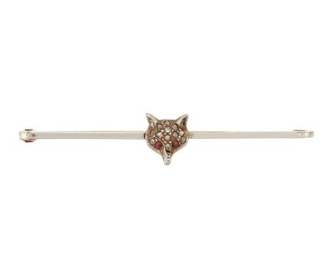 A DIAMOND-SET FOX MASK BAR BROOCHThe polished bar centred by a fox mask, with circular-cut ruby eyes and rose-cut diamonds th