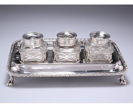 A GEORGE III SILVER INKSTANDby Edward Aldridge II, London 1762rectangular form, with beaded rim and three cut glass detachabl