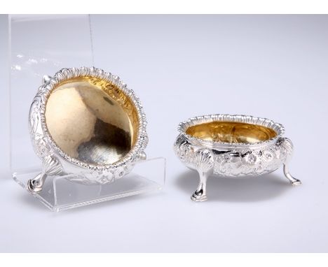 A PAIR OF VICTORIAN SILVER SALTSby Robert Harper, London 1858Circular, chased with foliage, each engraved with an initial to 