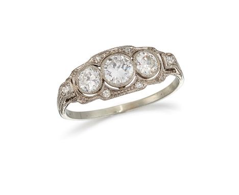 A THREE-STONE DIAMOND RINGOf geometric outline, containing a graduated trio of brilliant-cut diamonds, with similarly-cut dia