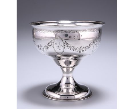 A GEORGE III IRISH SILVER SUGAR BOWLby Matthew West, Dublin 1790Ogee form with pedestal foot, engraved with floral swags and 