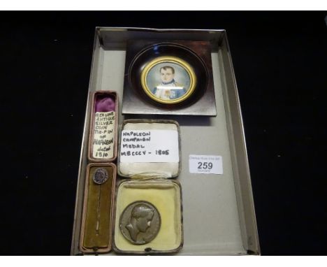 Three items relating to Napoleon, to include: a miniature portrait in wooden frame, a commemorative campaign medal and a whit