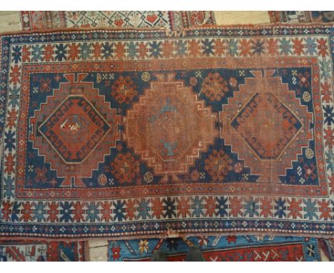 An Indian rectangular carpet (200cm x 118cm).