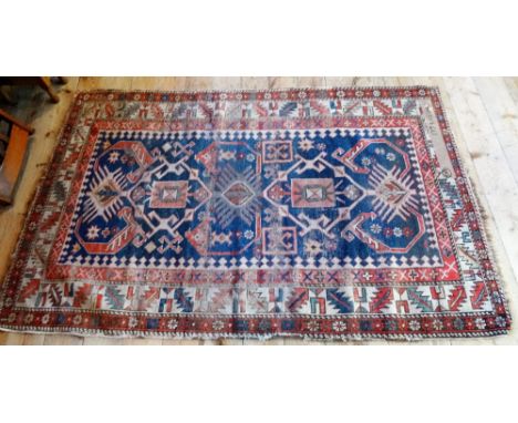 A Turkish-style carpet (177cm x 115cm).