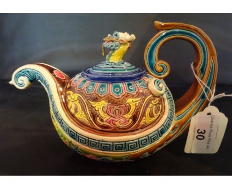 A Taiwan-Cochin ceramic teapot, having dragon head finial (12cm).