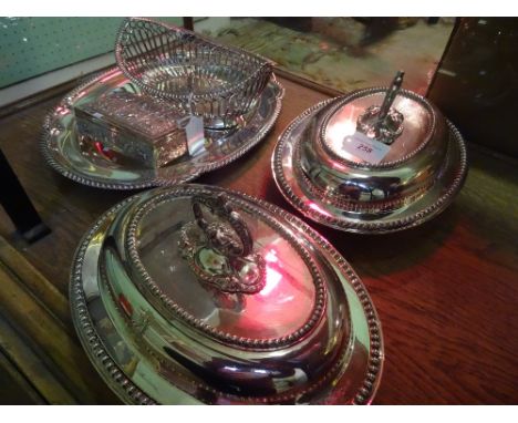 Two silver plated tureens, together with a silver plated oval salver, a silver basket and a white metal lidded box, having an
