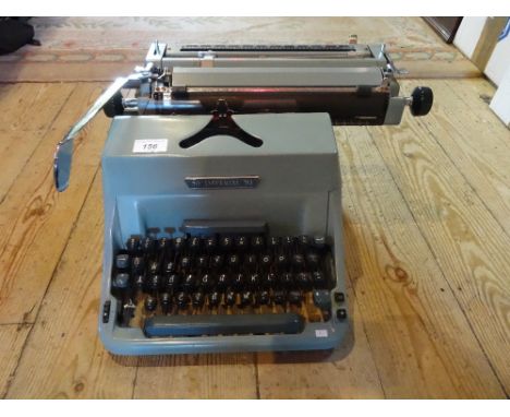 An Imperial 70 typewriter with original canvas cover.