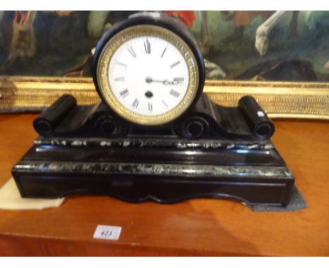 A Victorian drum head slate mantle clock the enamel dial bearing Roman numerals (29cm tall).