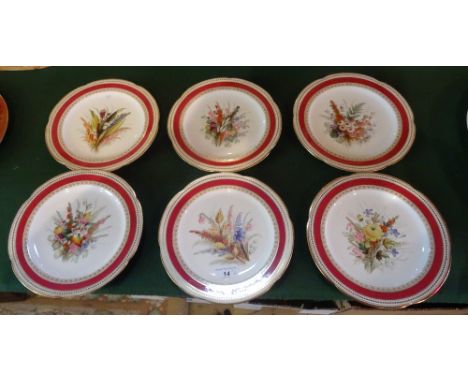 A set of six Royal Worcester dessert plates, each having hand painted floral decoration within red and gilt borders, painted 