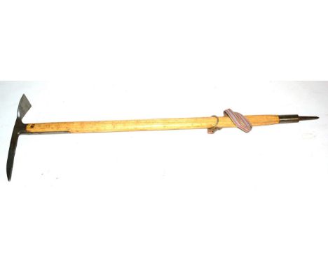A German Third Reich Mountaineering Axe, the steel head stamped maker's name, ''Stubai'', etched with Third Reich emblem and 