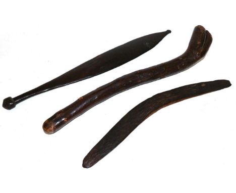 A 19th Century Australian Aboriginal Woomera (Spear Thrower), slightly convex on one side, the handle incised with a geometri