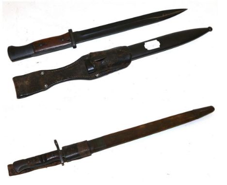 A German Third Reich 98/05 Bayonet, the blued steel blade stamped 41ffc and 210 at the ricasso, the blued hilt with waffenamt