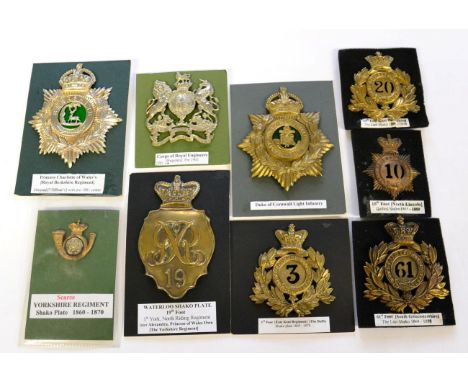 A Collection of Nine Good Quality Reproduction Shako and Helmet Plates, in brass and white metal, to 19th Foot 1st York, Nort