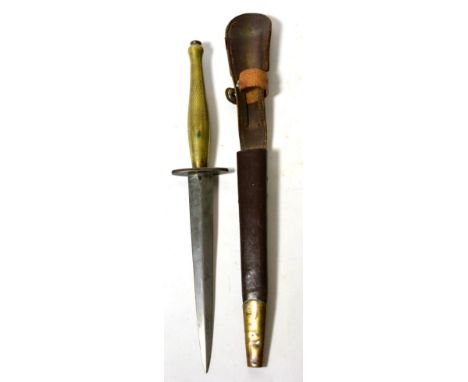 A Second World War Commando Knife, Second Pattern, with 16.5cm double edge hand forged steel blade, unmarked, the steel cross