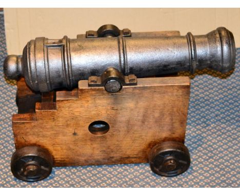 A Victorian Model of a Signal Cannon, the 48cm triple ringed iron barrel with flared muzzle, globular cascabel, cylindrical t